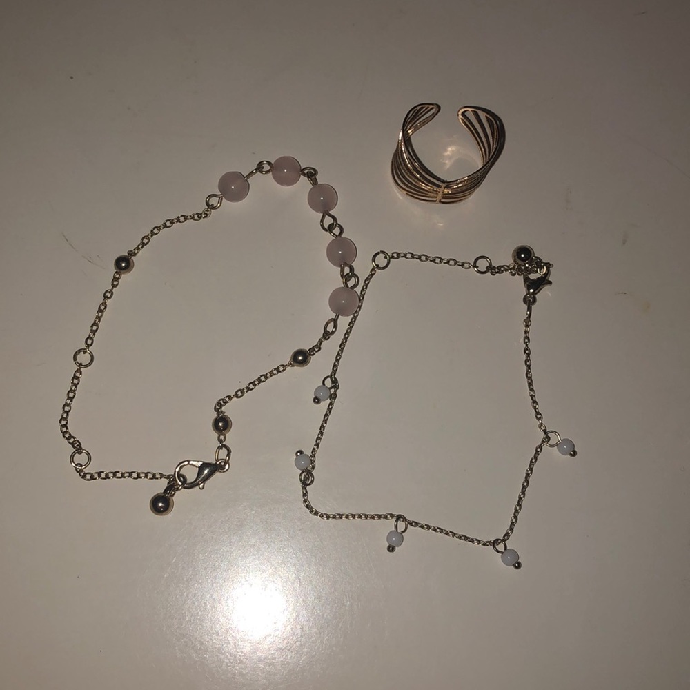 Two bracelets and a ring